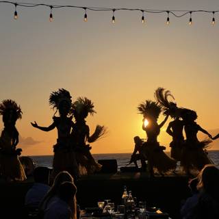 Sunset Hula Performance at a Hawaiian Restaurant