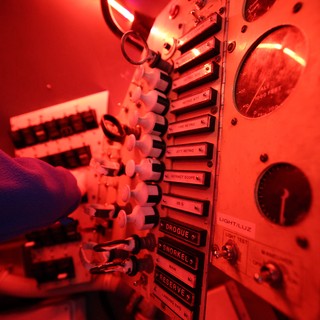 Submarine Control Panel Bathed in Red Light