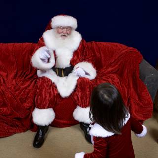 A Little Girl's Christmas with Santa Claus