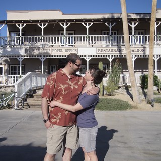 Couple's Romantic Moment at Desert Hotel Saloon