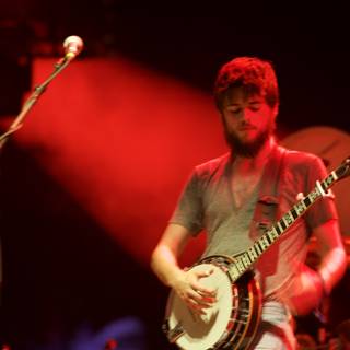 Winston Marshall strums banjo at Coachella 2011