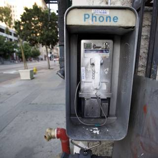 A Blast from the Past: Payphone on the Sidewalk