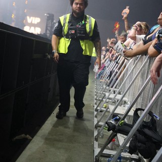 Security Guard Patrols Concert Barrier at Wobbleland 2026