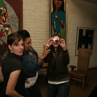 Friends Capture Moments at an Art Gallery Opening