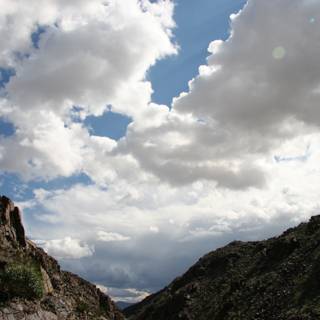 Canyon glimpse of the Cumulus clouds and Mountain Range