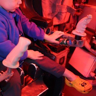 Young Scientist Exploring Microscopy at Science Center