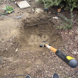 Digging a Garden Hole with Hand Tool