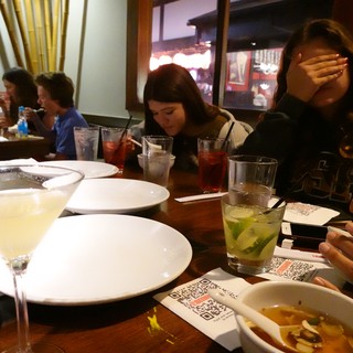 Friends Dining Together at Restaurant Table