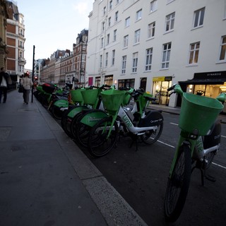 Green Bike Share Station on London Street at Dusk