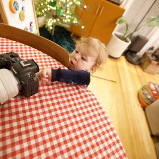 Toddler Reaching for Camera at Christmas Morning