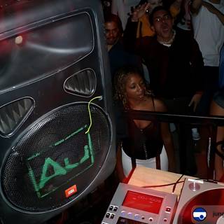 DJ spinning at a club party