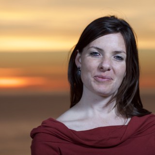 Woman Portrait at Golden Sunset Over Ocean