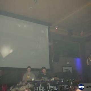 The DJ Rocks the Nightclub