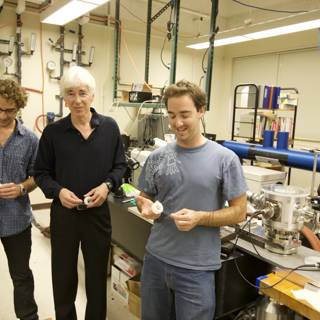 Three Men Conducting Factory-Grade Research in Laboratory