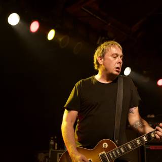 Brian Baker Rocks the Stage with His Guitar at 2007 Bad Religion Glasshouse Concert