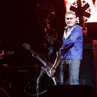 Morrissey and Boz Boorer Perform a High-Energy Concert on Stage with Two Guitars