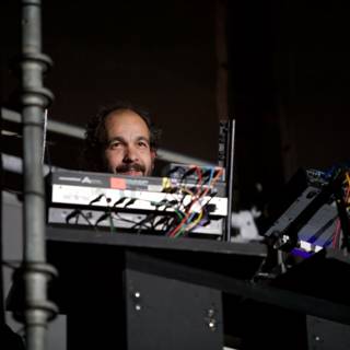 Étienne de Crécy performing on his laptop at Coachella 2009