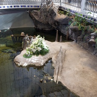 Memorial Garden with White Floral Tribute Display