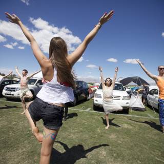 Yoga in the Grass with a View of Cars