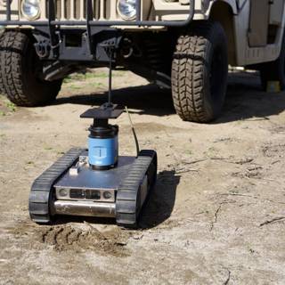 Outdoor Adventure with a Small Robot and a Truck