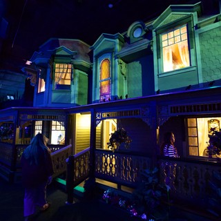 Victorian Houses at Night with Blue and Green Lighting