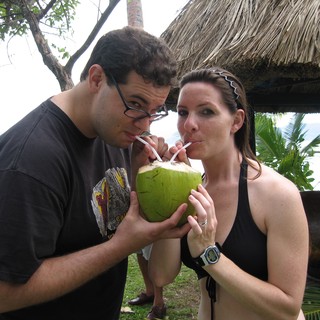 Couple Sharing Fresh Coconut Water in Fiji