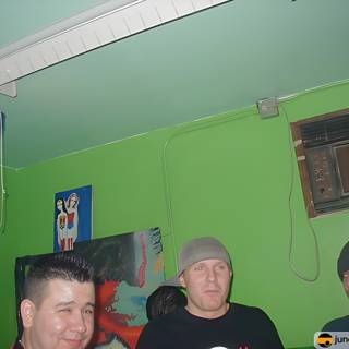 Three Men in a Green Room