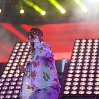 Floral shirted performer in the spotlight