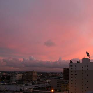 Pink Sky Over City Buildings