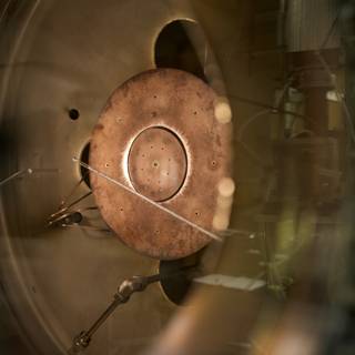 Rusty Sphere in a Machine