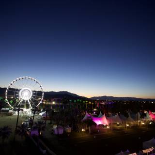 Illuminated Ferris Wheel at Night