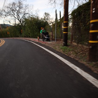 Early Morning Jogger on Winding Mountain Road