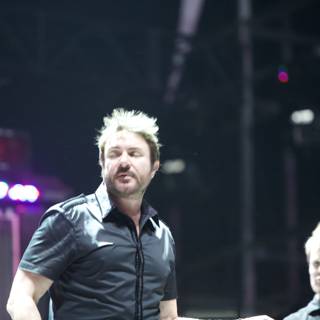 Two Men in Black Shirts Take the Stage at Coachella 2011