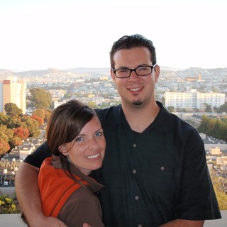 Couple Embracing with San Francisco Cityscape Behind