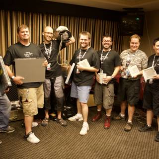 Group Shot of Defcon Attendees Holding Boxes