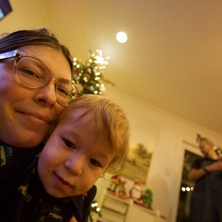 Christmas Eve Selfie: Parent and Child Share a Cozy Moment
