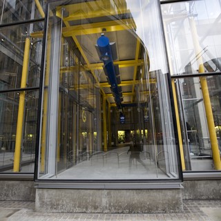 Transparent Glass Elevator Shaft in Modern London Building