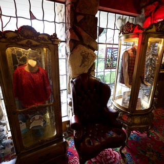 Vintage Christmas Display with Ornate Curio Cabinets