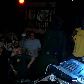 DJ Entertaining the Crowd at a Nightclub