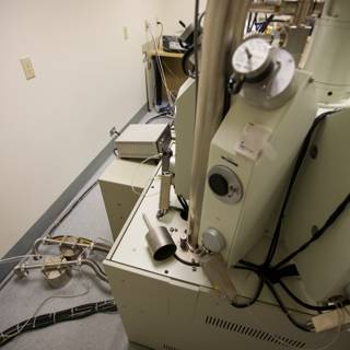 Man operating a machine in a laboratory