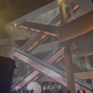 Futuristic Museum Interior with Crowd