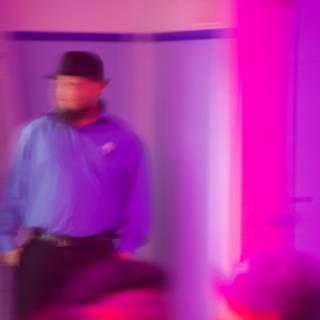 Man in Purple Room