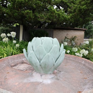 Artichoke Fountain Sculpture in Lush Garden Setting