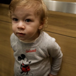 Toddler in Mickey Mouse Sweater at Home