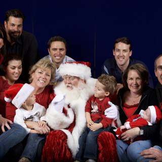 Santa Claus joins the Basche family for Christmas