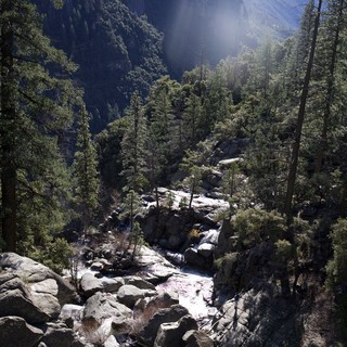 Mountain Stream Cascading Through Rocky Granite Canyon