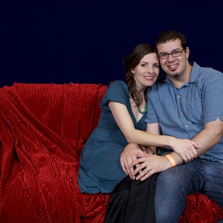 Couple Poses Together at Holiday Party Portrait