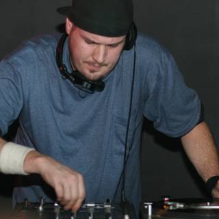 DJ Travis B in his Signature Black Hat
