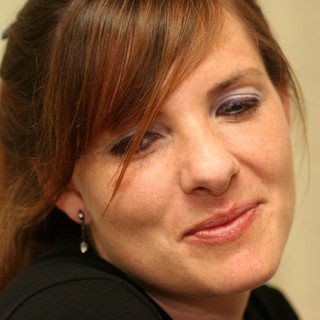Candid Close-Up Portrait of a Smiling Woman