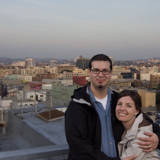 Couple Embracing on Downtown Los Angeles Rooftop